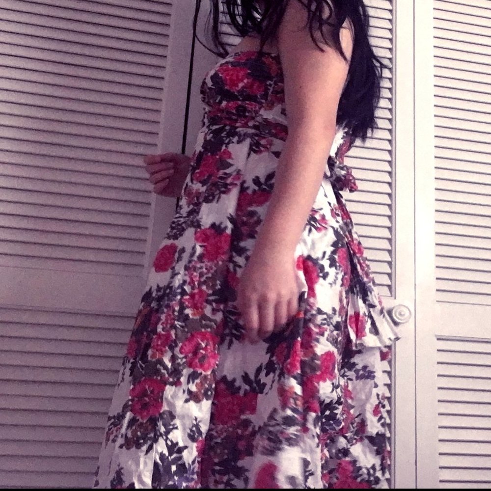 White dress with a pink flowery design